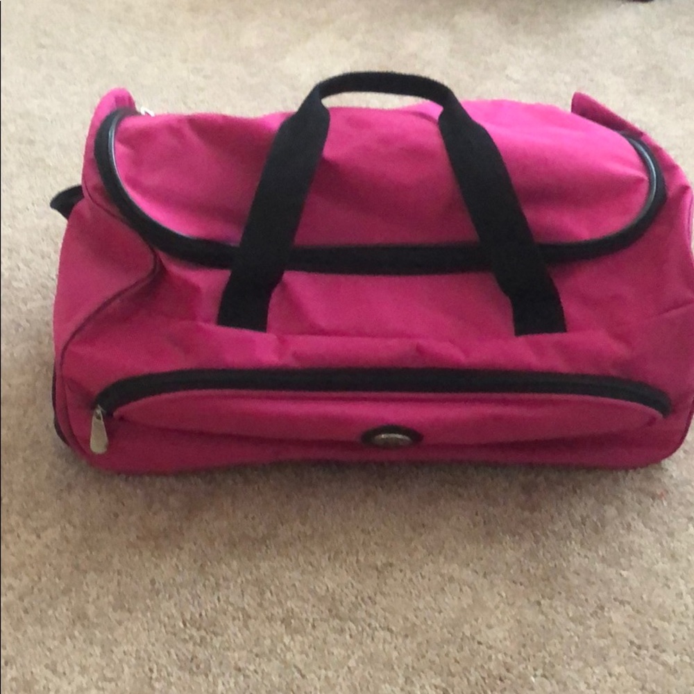 Travel duffle bag on wheels.  20” long By 9” high